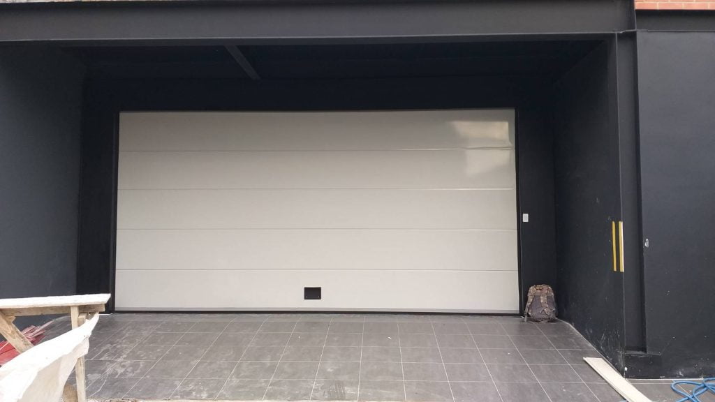 Installation photo of Garage Doors for Single House in Pathum Thani by OZ DOOR (2)