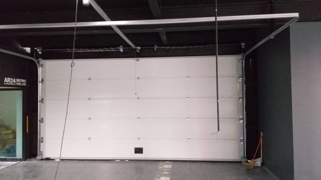 Installation photo of Garage Doors for Single House in Pathum Thani by OZ DOOR (4)