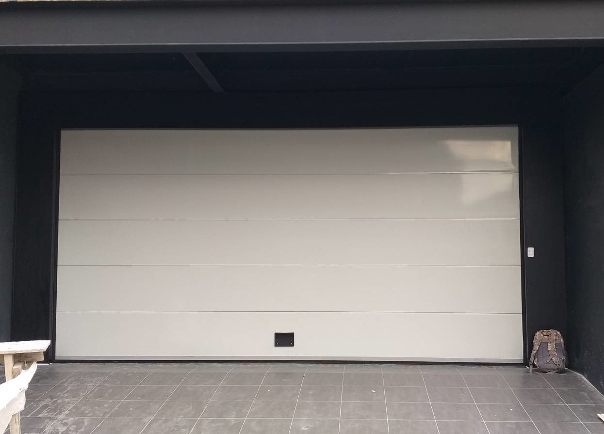 Installation photo of Garage Doors for Single House in Pathum Thani by OZ DOOR