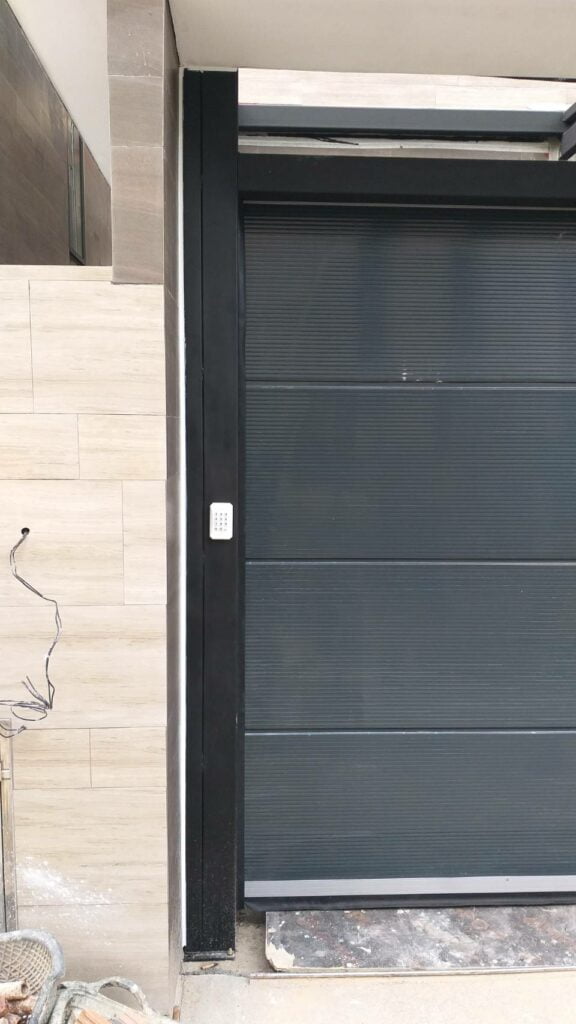 Installation photo of Garage Doors for Single House in Bangkok by OZ DOOR (2)