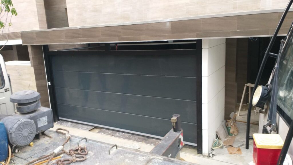 Installation photo of Garage Doors for Single House in Bangkok by OZ DOOR (5)