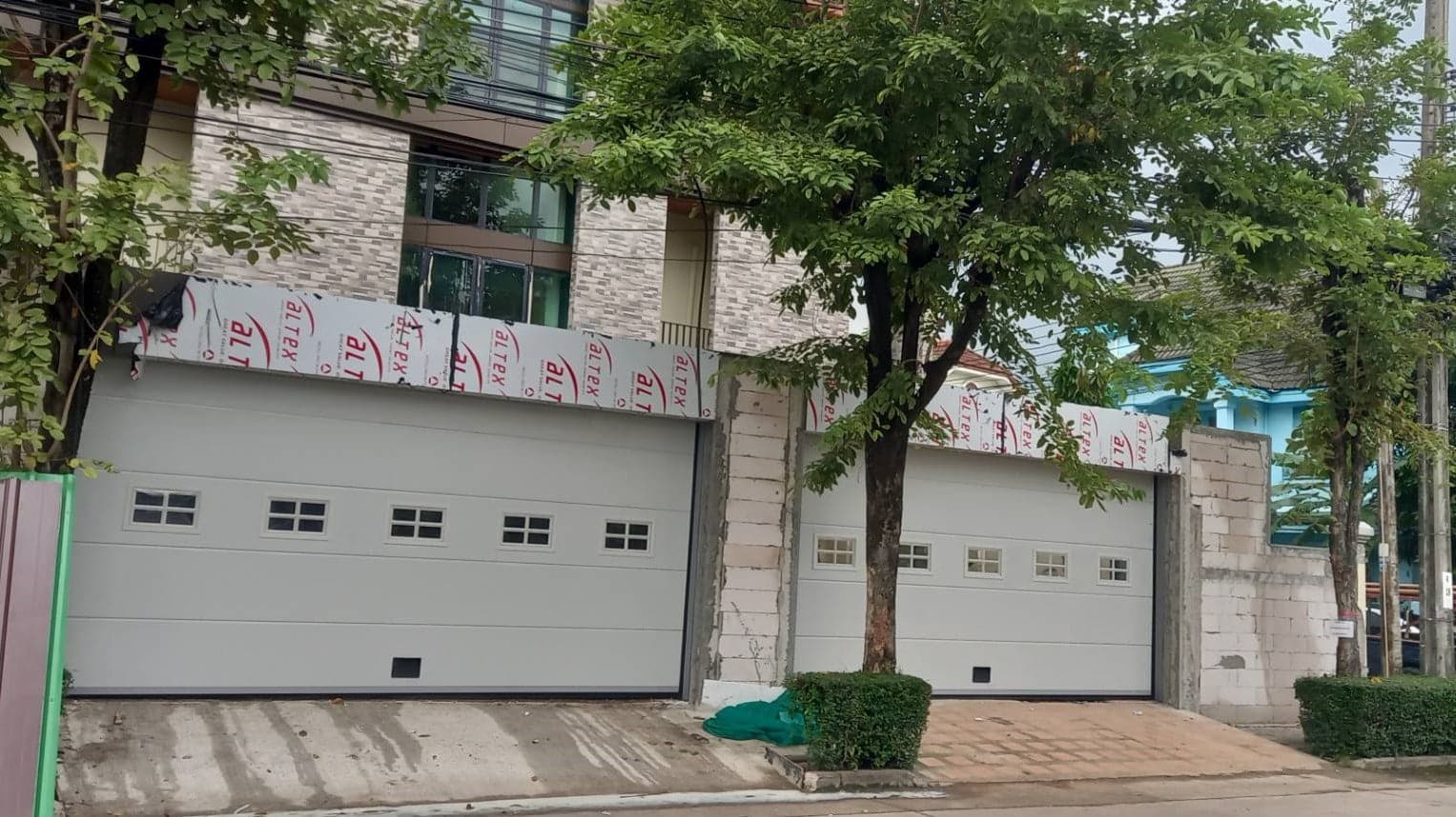 Installation photo of Garage Doors for Single House in Bangkok by OZ DOOR