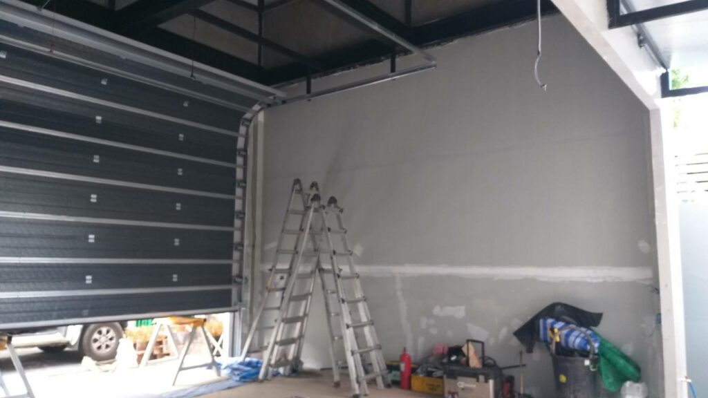 Installation photo of Garage Doors for Single House in Bangkok by OZ DOOR