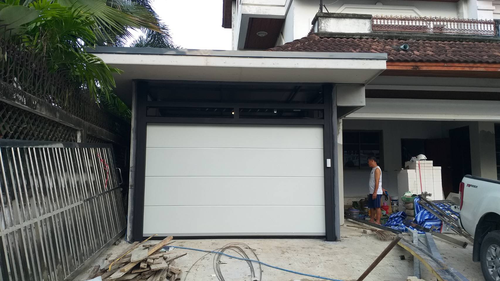 Installation photo of Garage Doors for Single House in Pathum Thani by OZ DOOR