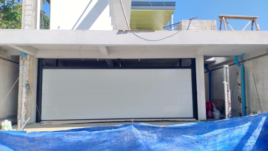 Installation photo of Garage Doors for Single House in Chonburi by OZ DOOR