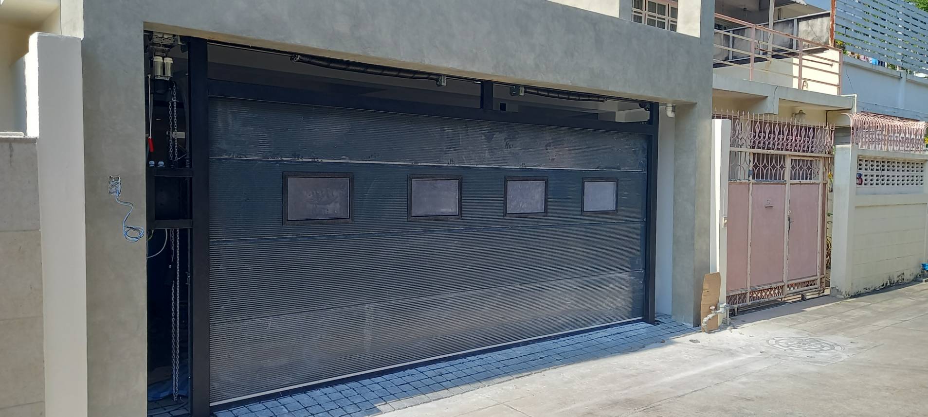 Installation photo of Garage Doors for Single House in Nonthaburi by OZ DOOR