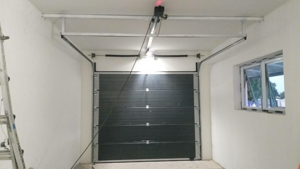 Installation photo of Garage Doors for Single House in Roi Et by OZ DOOR (3)