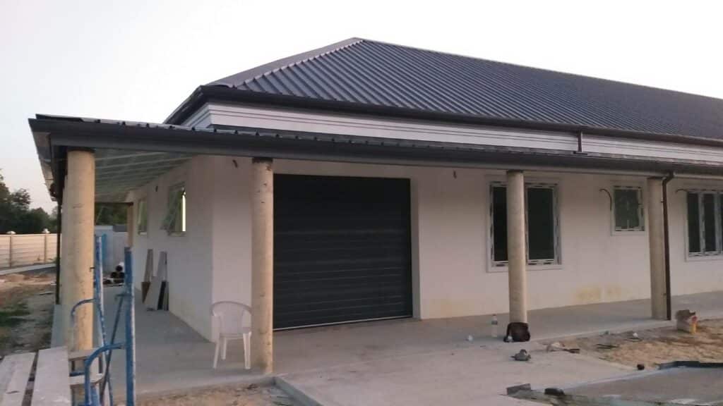 Installation photo of Garage Doors for Single House in Roi Et by OZ DOOR (2)