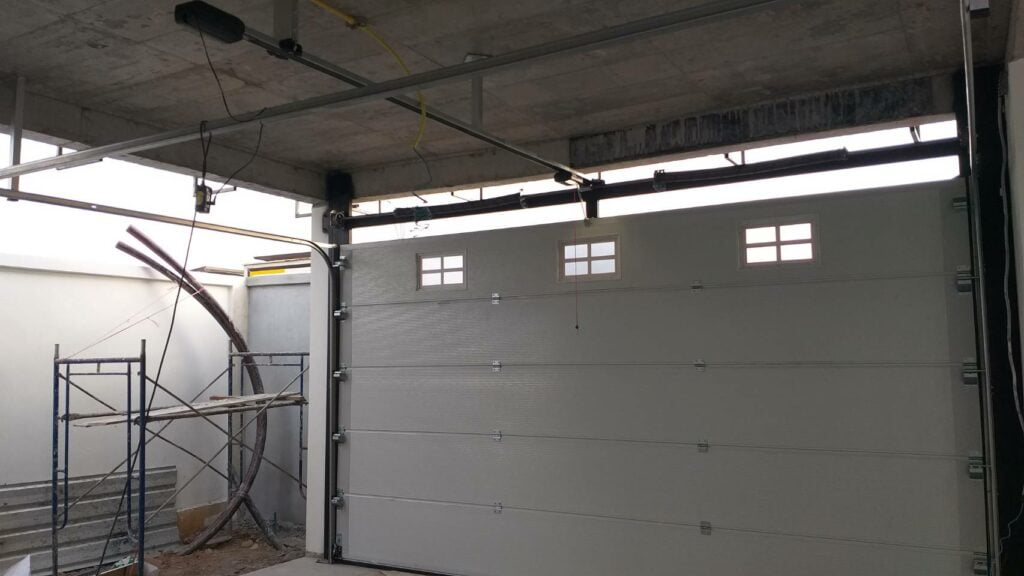 Installation photo of Garage Doors for Single House in Samut Prakan by OZ DOOR (2)