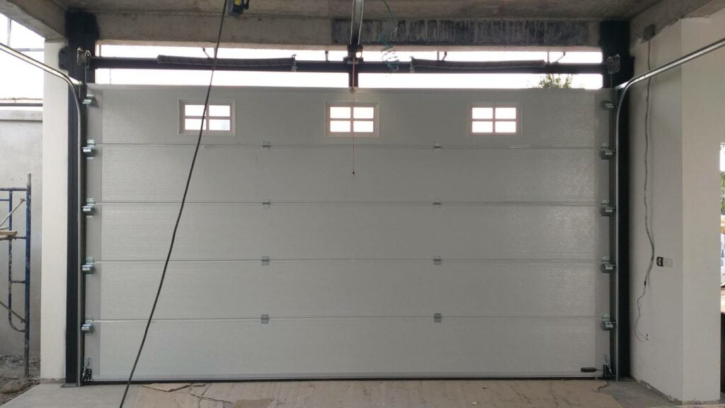 Installation photo of Garage Doors for Single House in Samut Prakan by OZ DOOR (3)