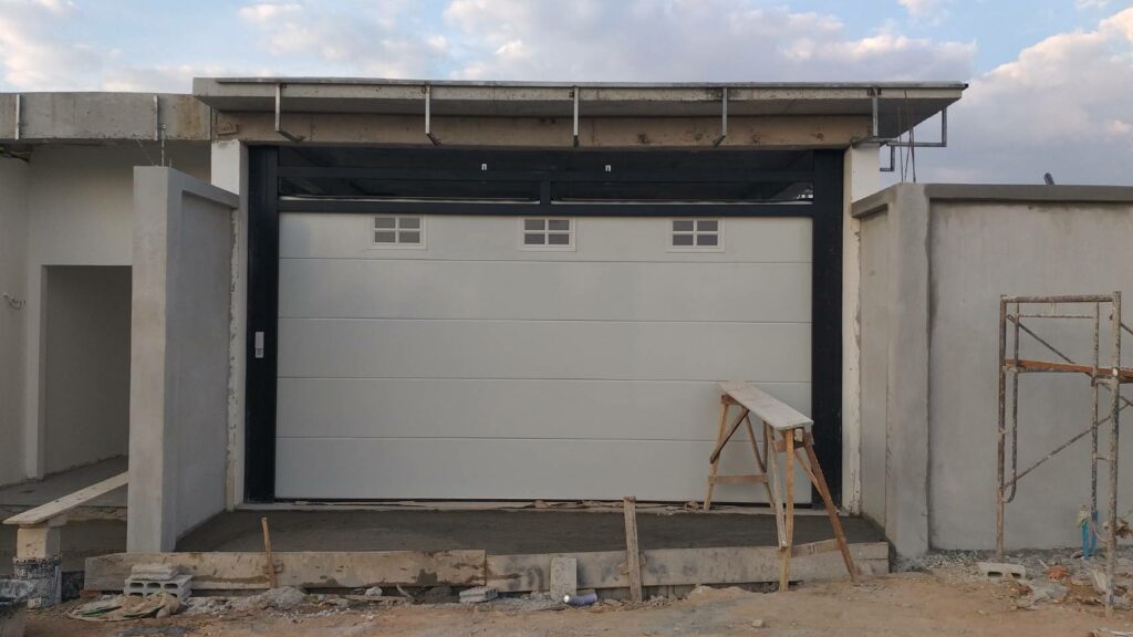Installation photo of Garage Doors for Single House in Samut Prakan by OZ DOOR