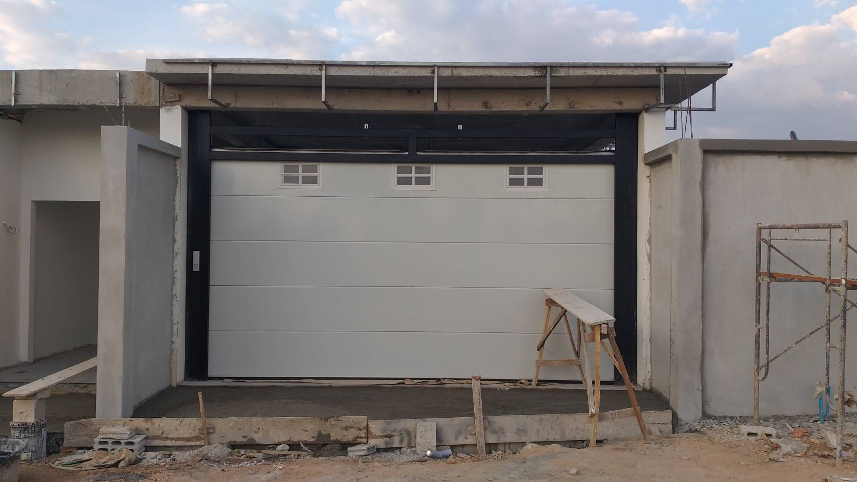 Installation photo of Garage Doors for Single House in Samut Prakan by OZ DOOR