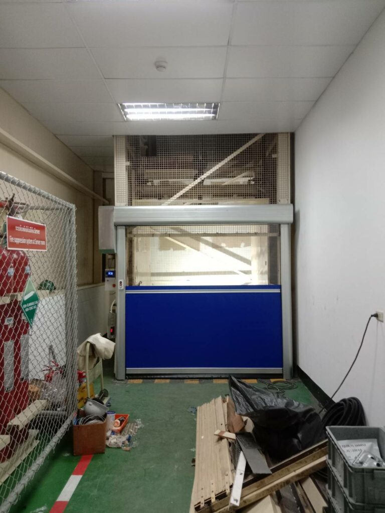 High speed door interlock with cargo lift