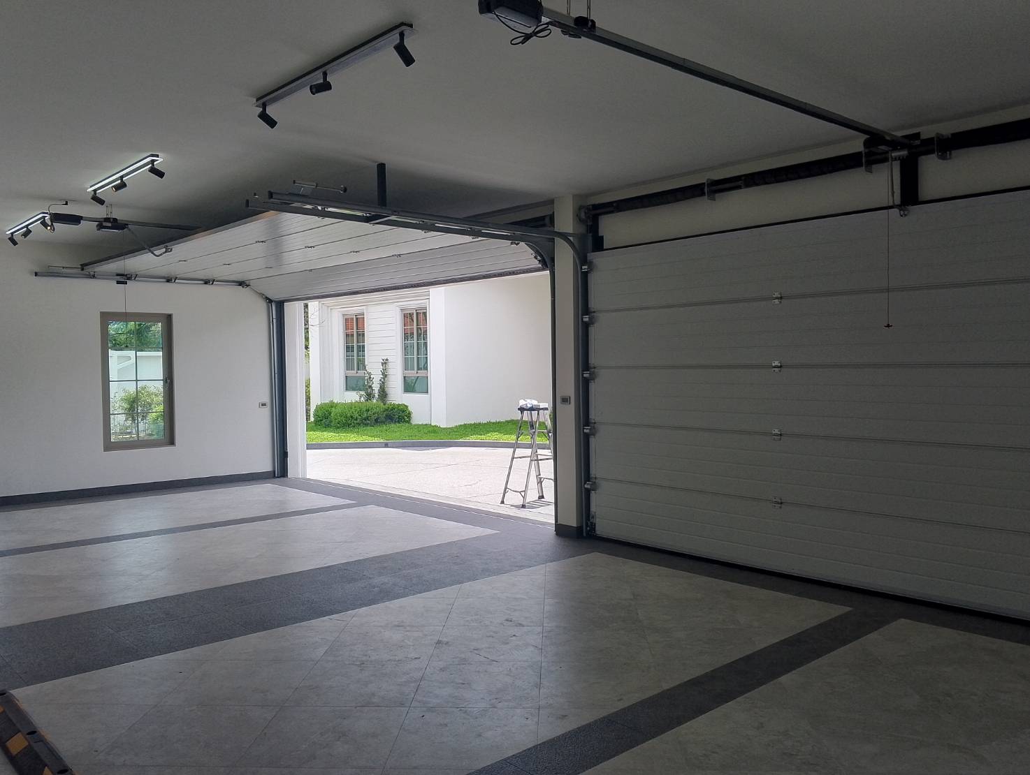 Installation photo of Garage Doors for Single House in Bangkok by OZ DOOR