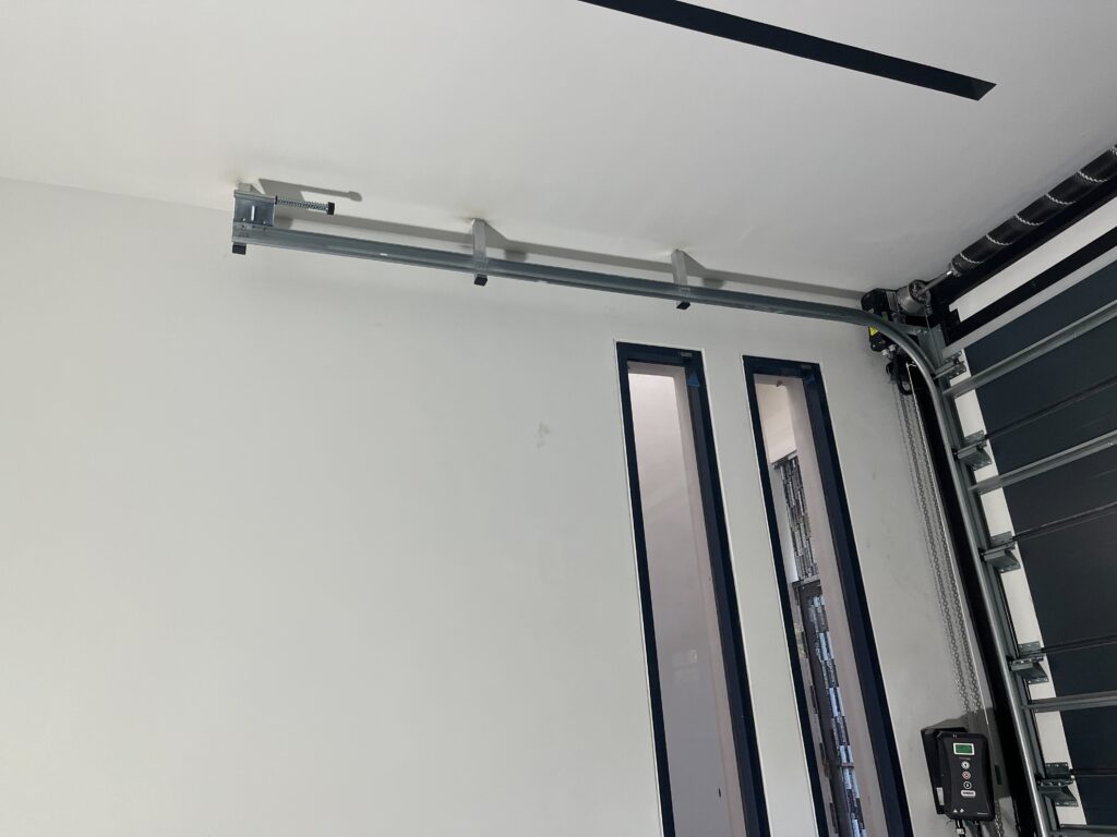 Installation photo of Garage Doors for Housing Estate / Developer in Samut Prakan by OZ DOOR (3)