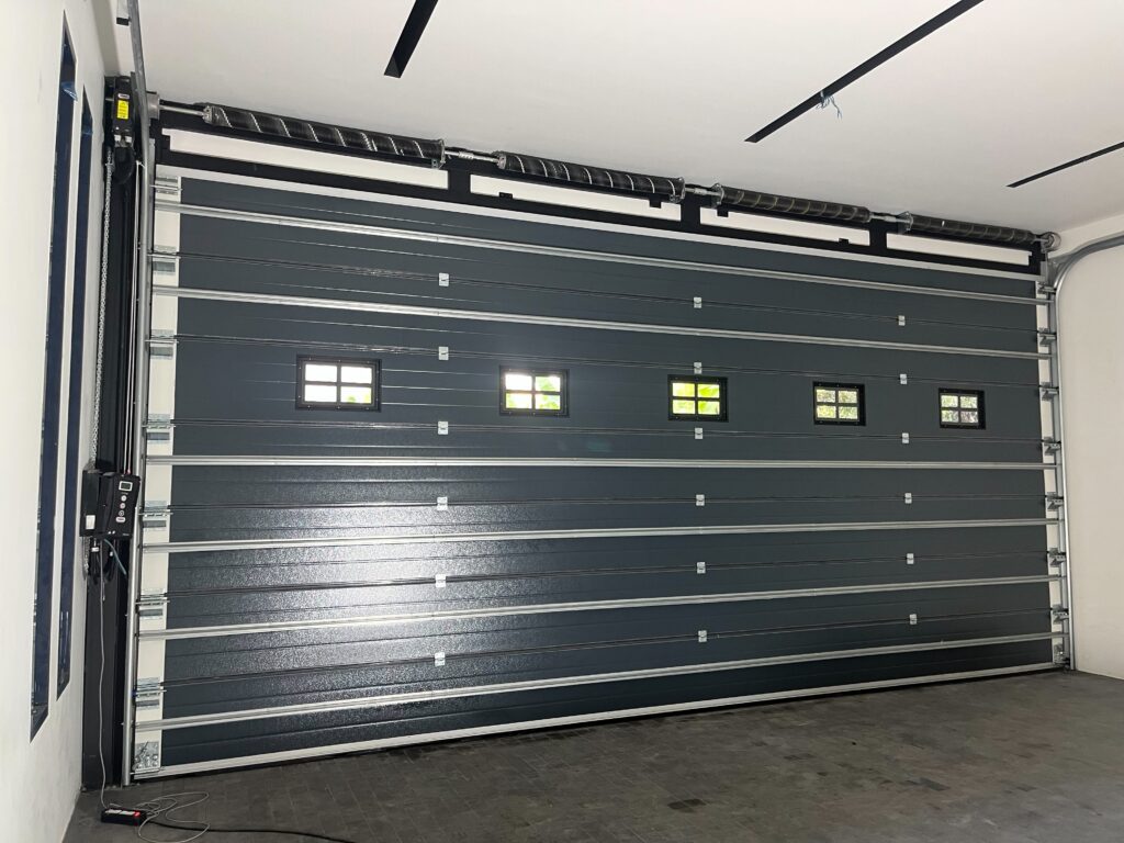 Installation photo of Garage Doors for Housing Estate / Developer in Samut Prakan by OZ DOOR (4)