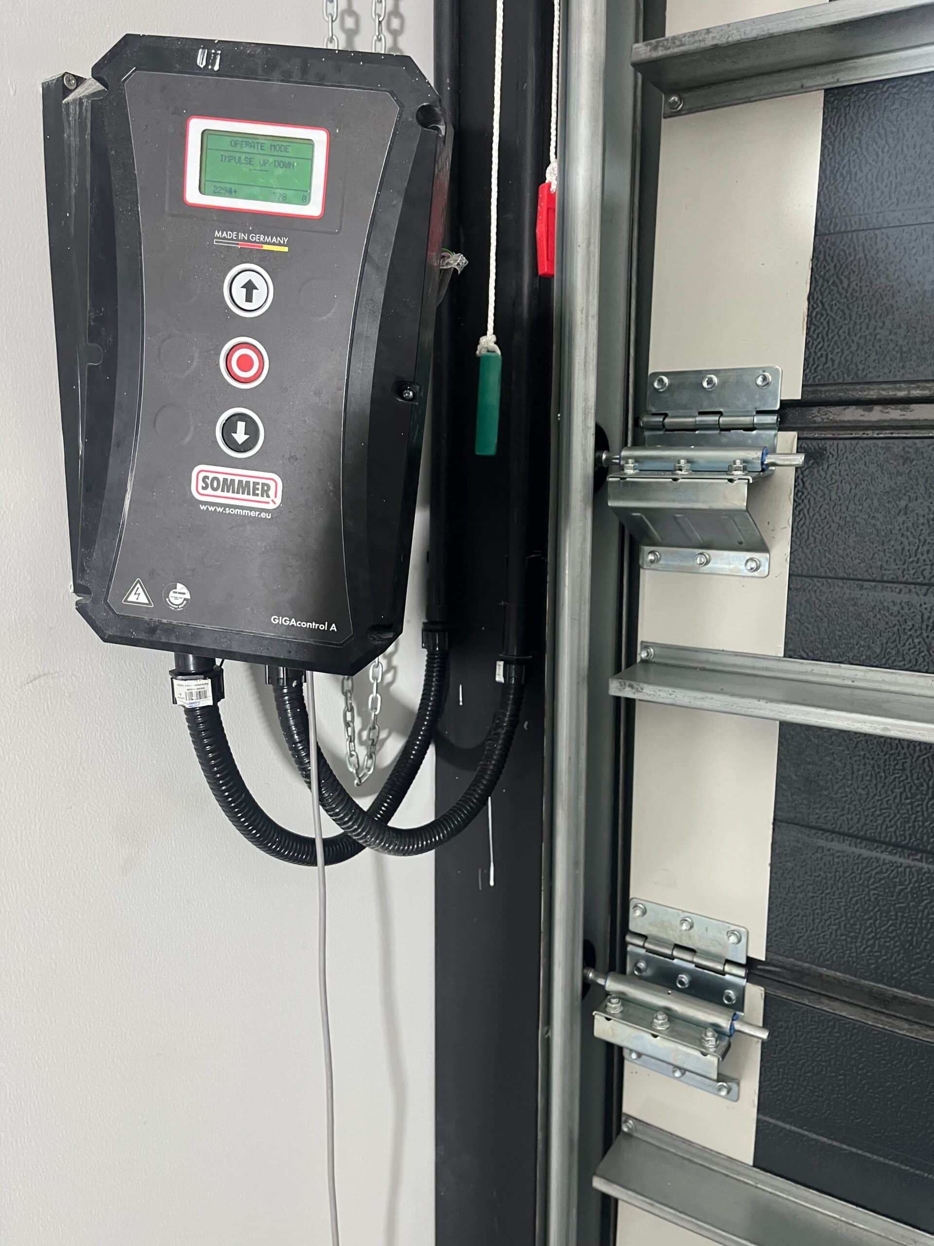 Installation photo of Garage Doors for Housing Estate / Developer in Samut Prakan by OZ DOOR (5)