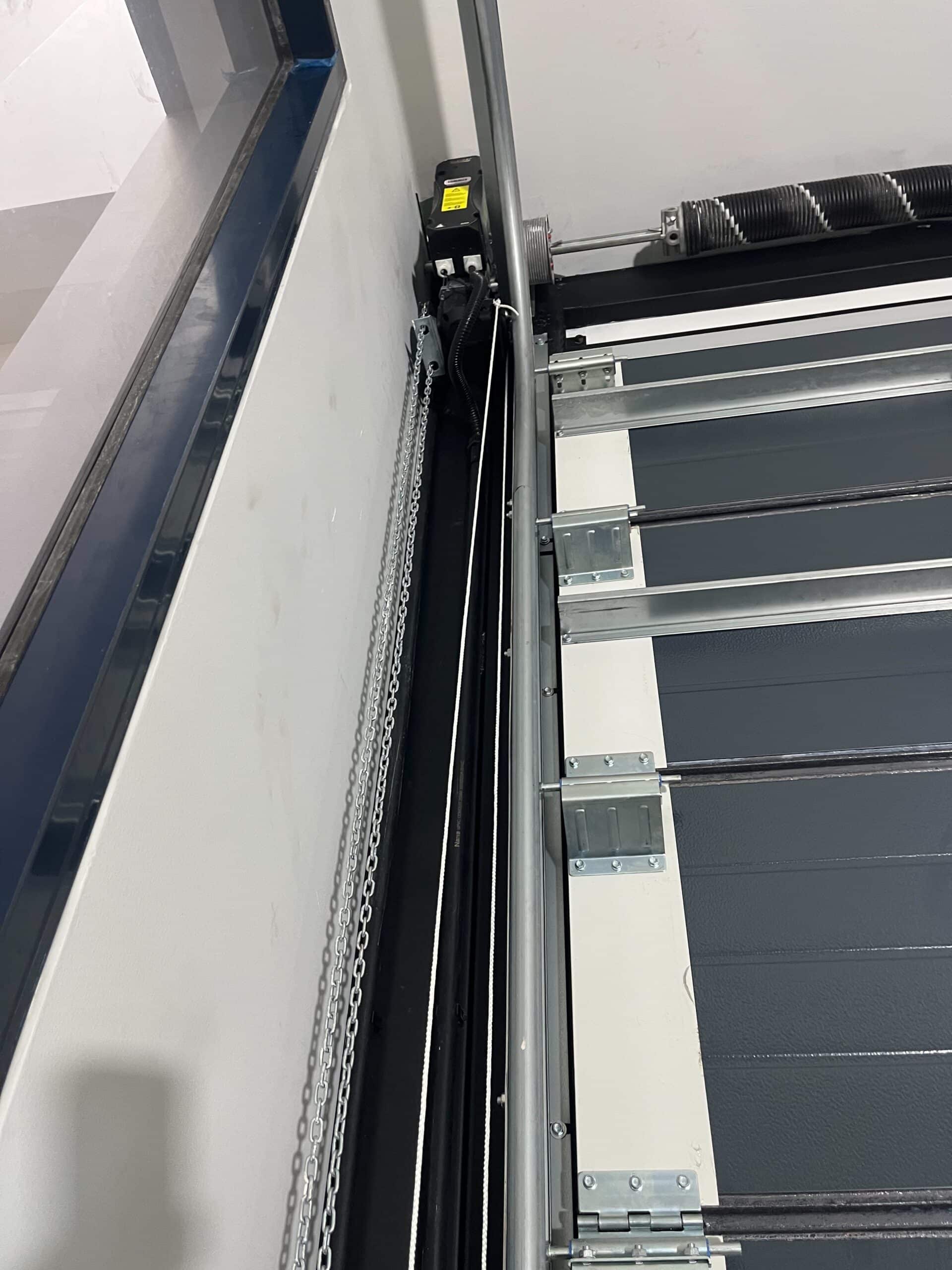 Installation photo of Garage Doors for Housing Estate / Developer in Samut Prakan by OZ DOOR (7)