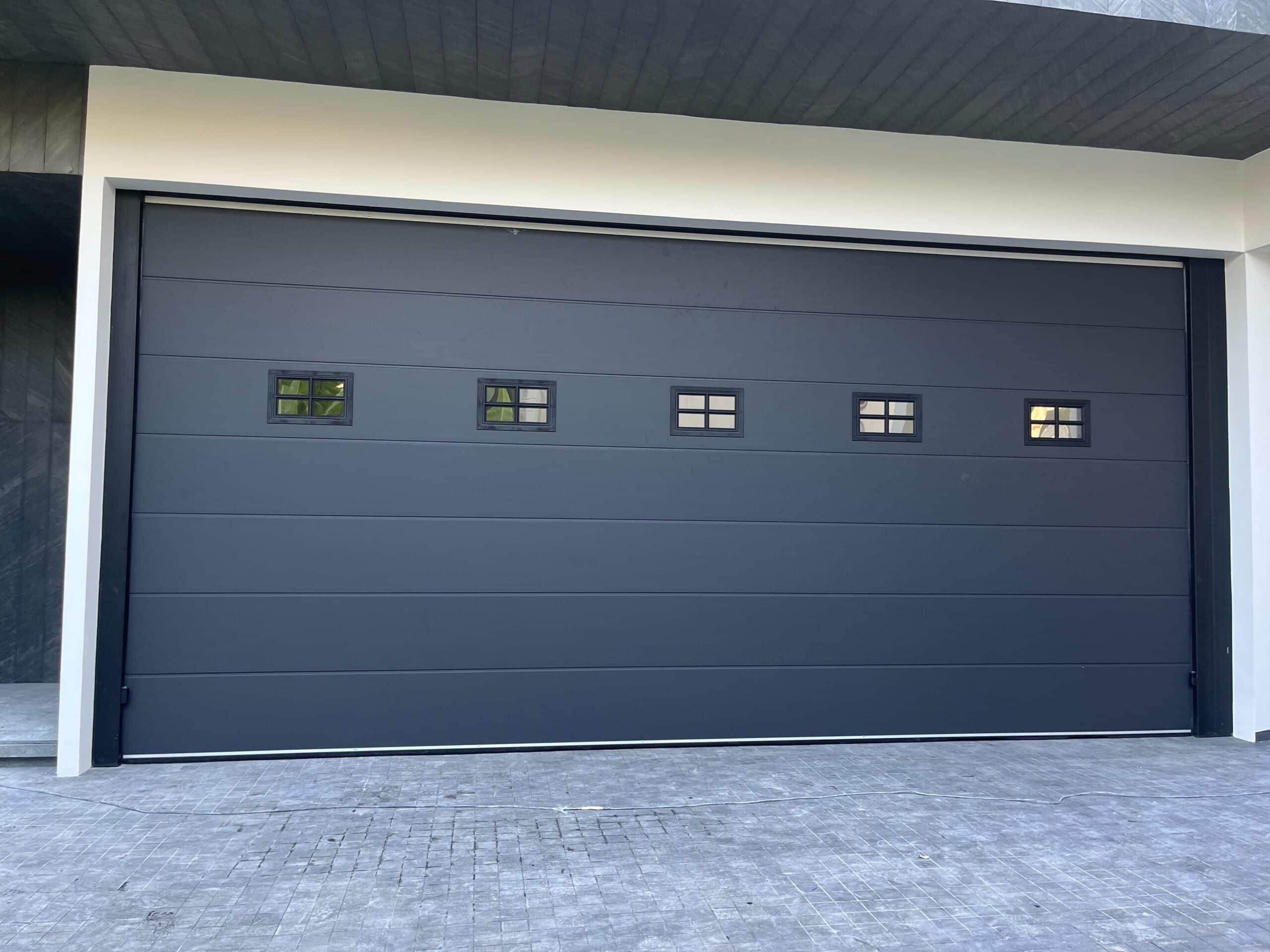 Installation photo of Garage Doors for Housing Estate / Developer in Samut Prakan by OZ DOOR