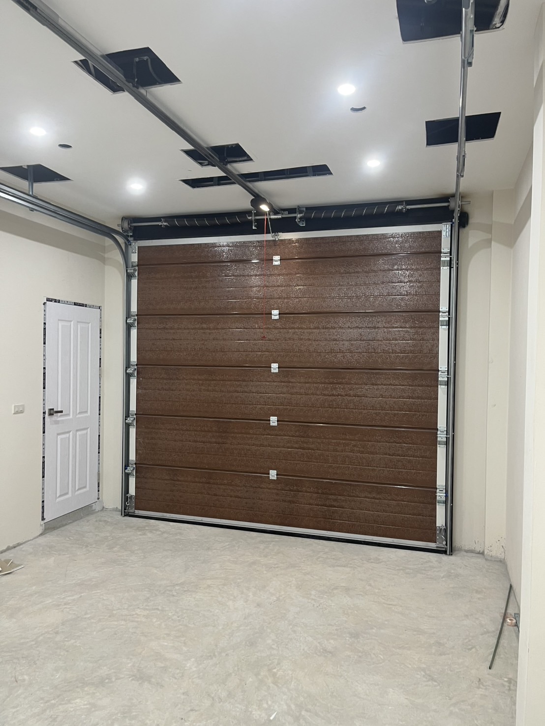 Installation photo of Garage Doors for Residential Projects in Nonthaburi by OZ DOOR (6)