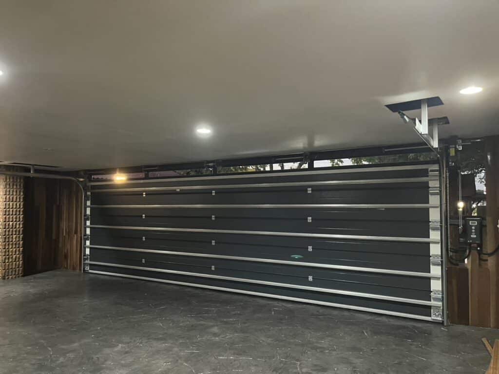 Installation photo of Garage Doors for Single House in Prachin Buri by OZ DOOR (3)