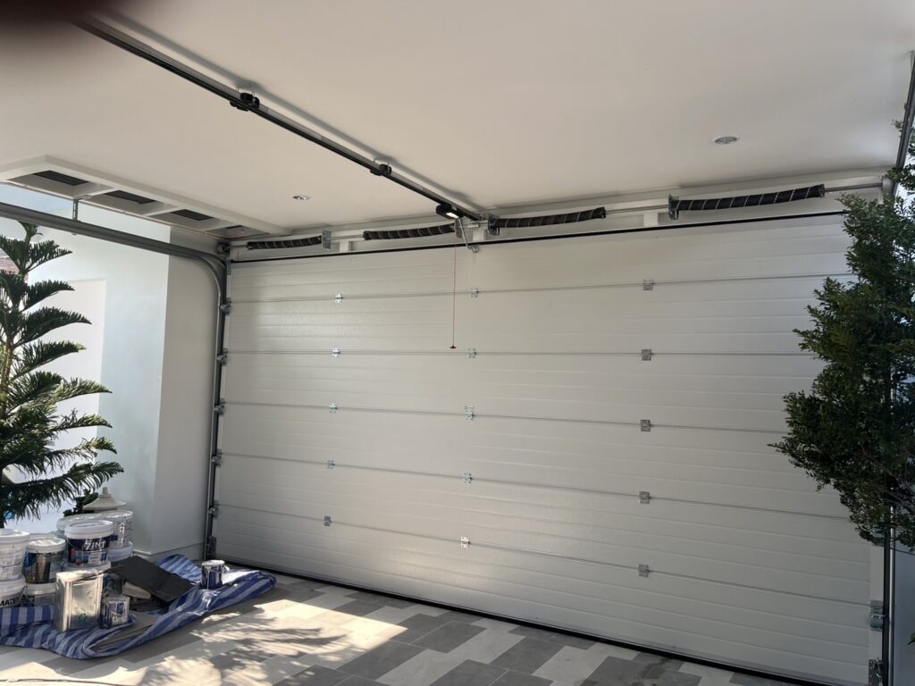Installation photo of Garage Doors for Residential Projects in Bangkok by OZ DOOR (3)