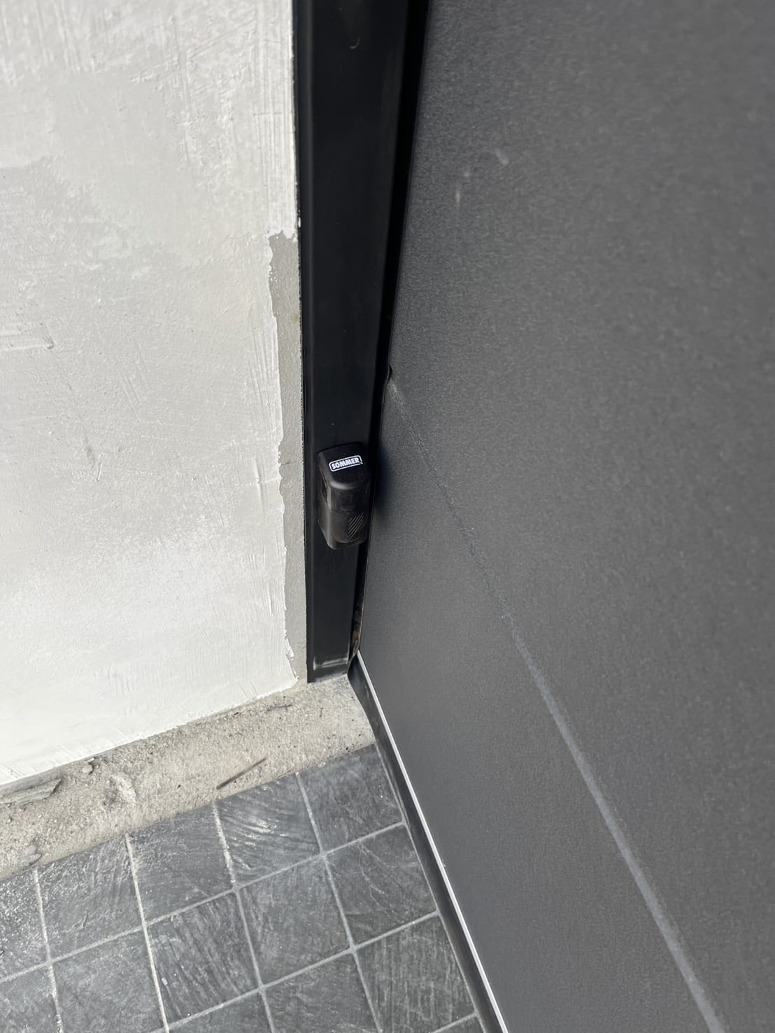 Installation photo of Garage Doors for Housing Estate / Developer in Pathum Thani by OZ DOOR (3)