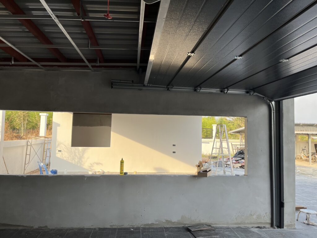 Installation photo of Garage Doors for Housing Estate / Developer in Pathum Thani by OZ DOOR (6)