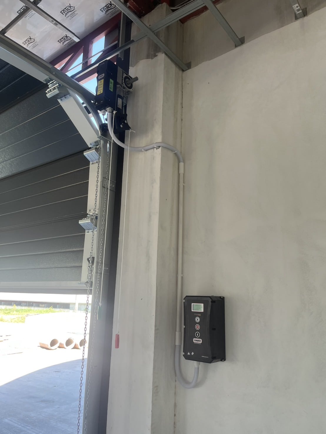 Installation photo of Garage Doors for Housing Estate / Developer in Phuket by OZ DOOR (11)