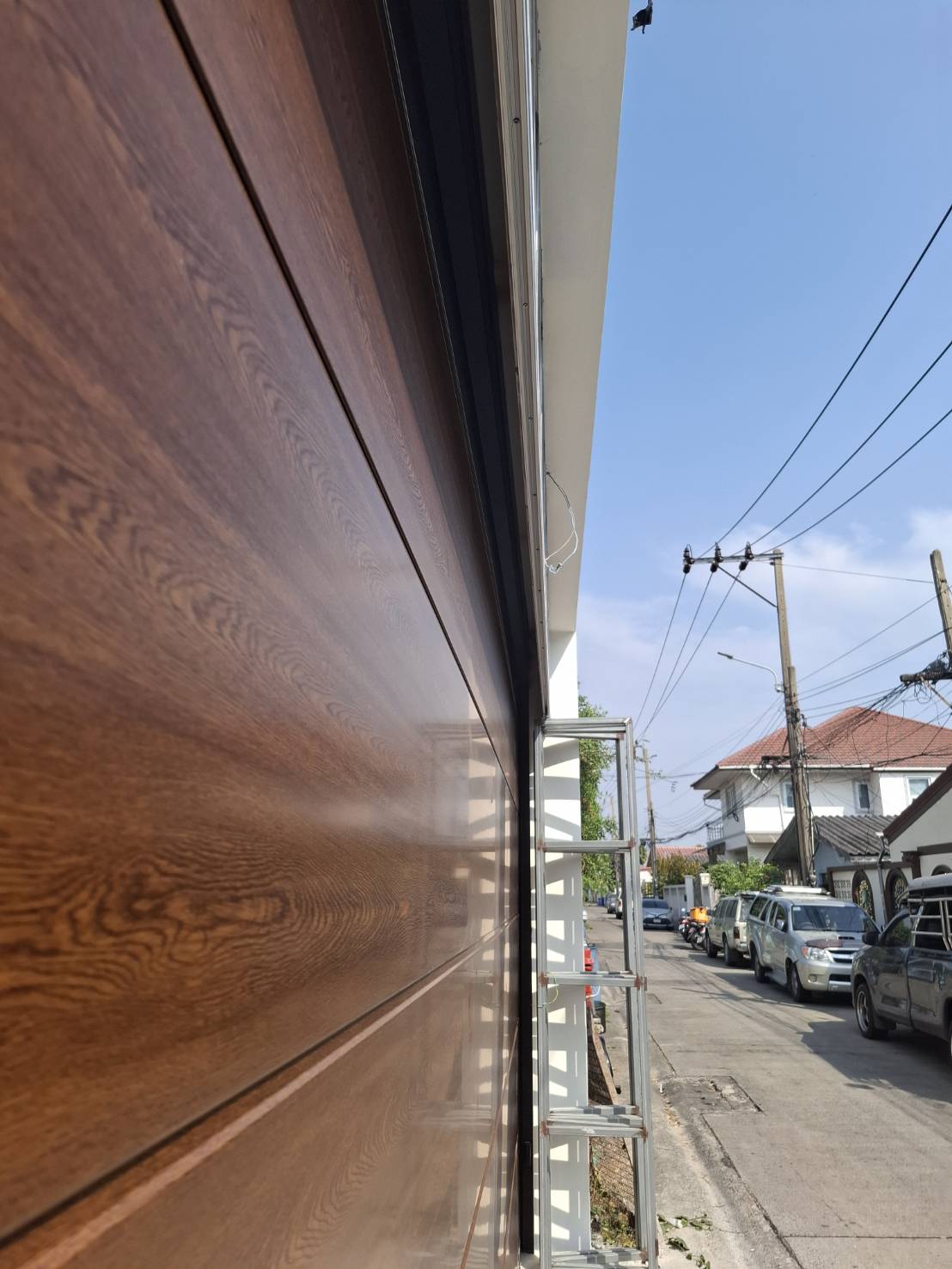 Installation photo of Garage Doors for Single House in Bangkok by OZ DOOR (3)