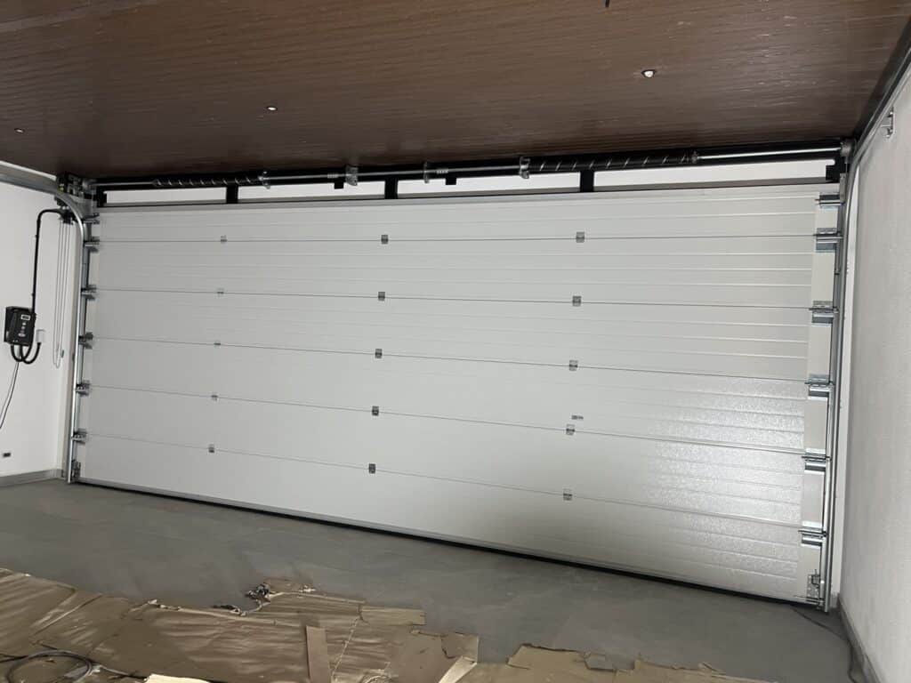 Installation photo of Garage Doors for Single House in Samut Prakan by OZ DOOR (11)