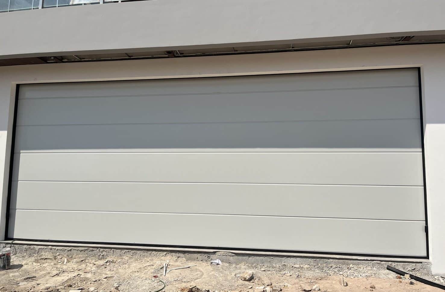 Installation photo of Garage Doors for Single House in Samut Prakan by OZ DOOR