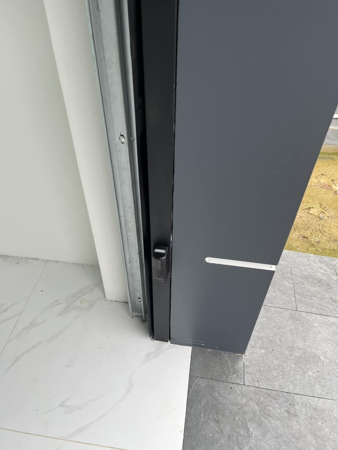 Installation photo of Garage Doors for Single House in Pathum Thani by OZ DOOR (11)