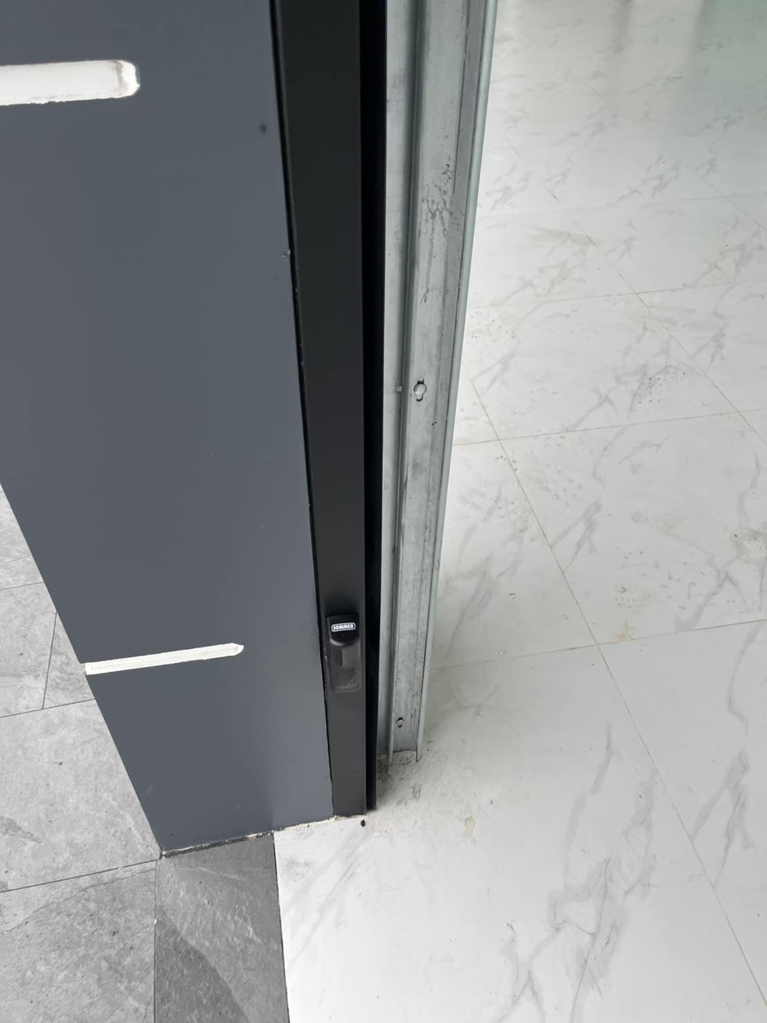 Installation photo of Garage Doors for Single House in Pathum Thani by OZ DOOR (12)