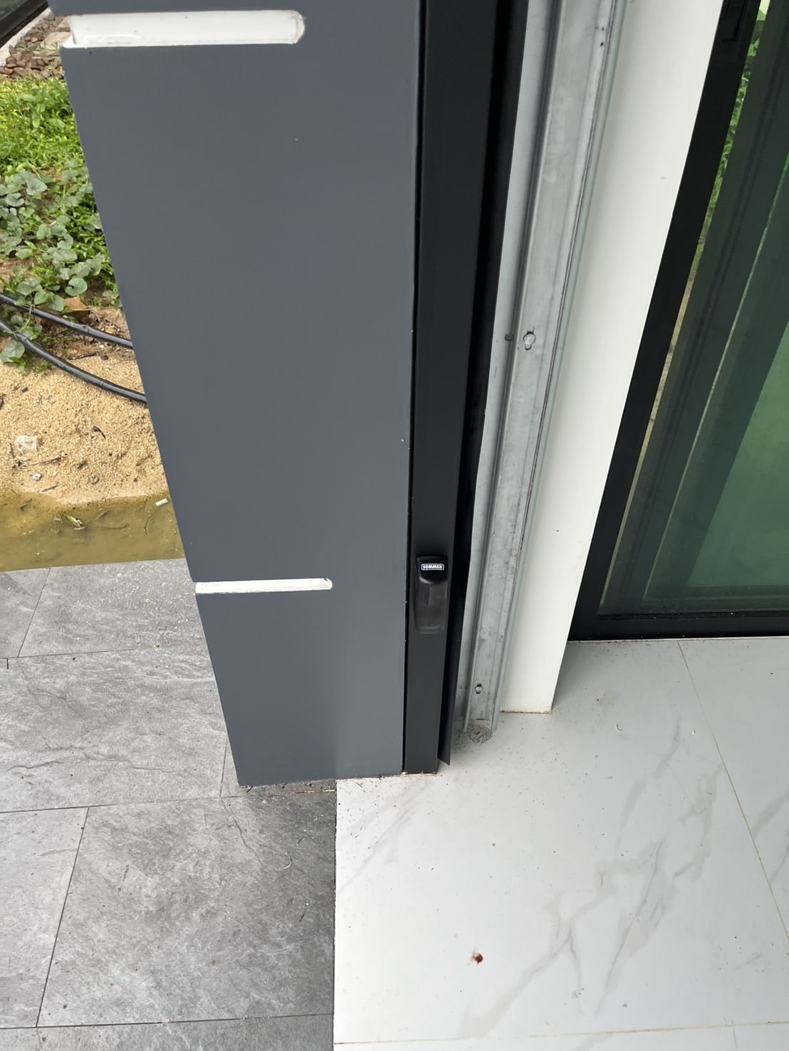 Installation photo of Garage Doors for Single House in Pathum Thani by OZ DOOR (14)