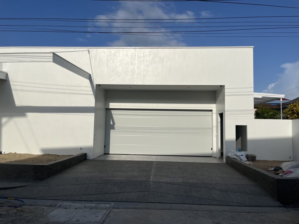 Installation photo of Garage Doors for Housing Estate / Developer in Nakhon Si Thammarat by OZ DOOR