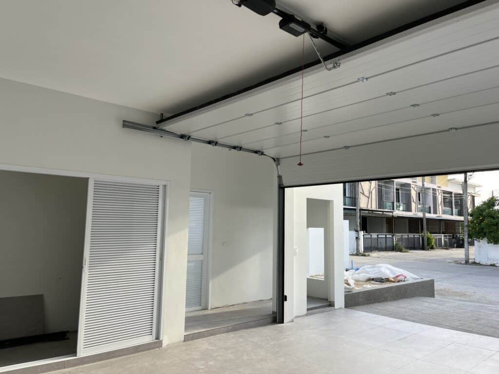 Installation photo of Garage Doors for Housing Estate / Developer in Nakhon Si Thammarat by OZ DOOR (4)