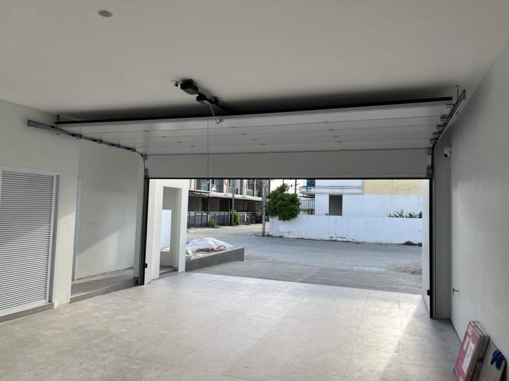 Installation photo of Garage Doors for Housing Estate / Developer in Nakhon Si Thammarat by OZ DOOR (5)