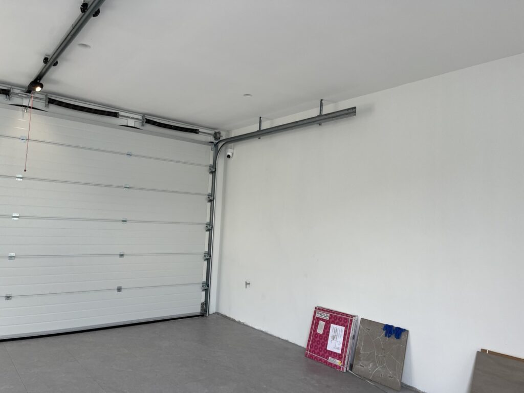 Installation photo of Garage Doors for Housing Estate / Developer in Nakhon Si Thammarat by OZ DOOR (7)