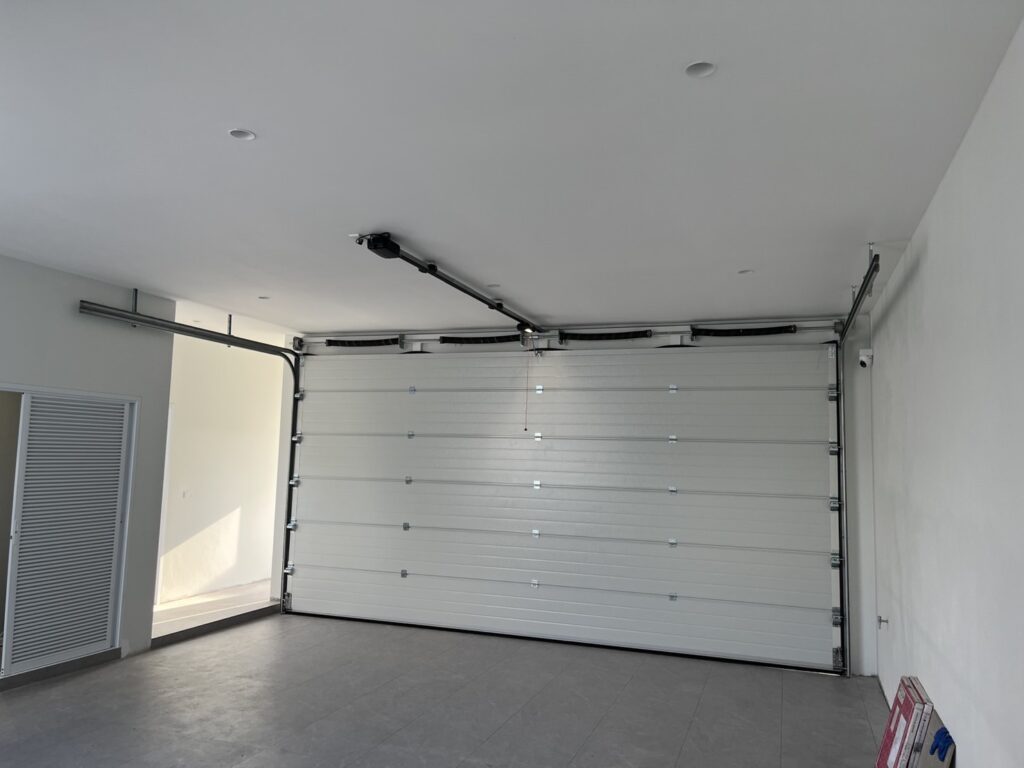 Installation photo of Garage Doors for Housing Estate / Developer in Nakhon Si Thammarat by OZ DOOR (8)