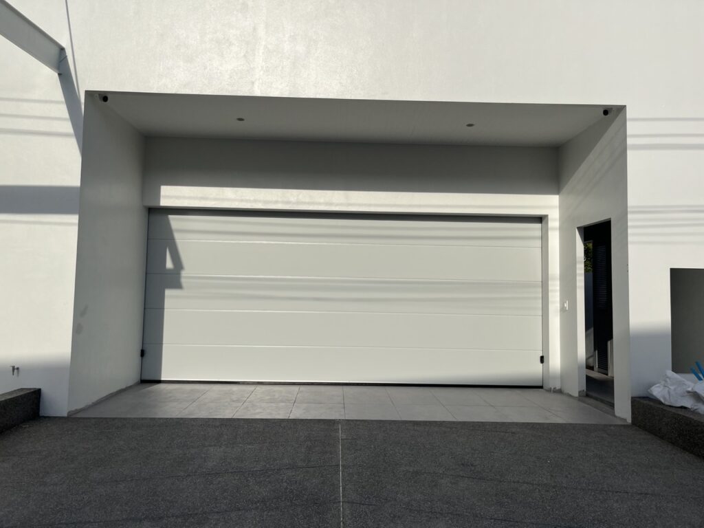 Installation photo of Garage Doors for Housing Estate / Developer in Nakhon Si Thammarat by OZ DOOR (11)