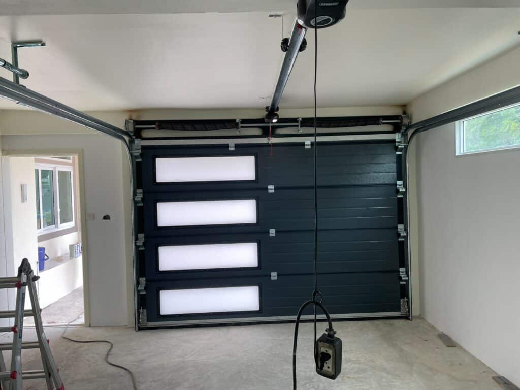 Installation photo of Garage Doors for Housing Estate / Developer in Nonthaburi by OZ DOOR