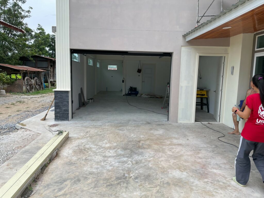 Installation photo of Garage Doors for Housing Estate / Developer in Nonthaburi by OZ DOOR (3)
