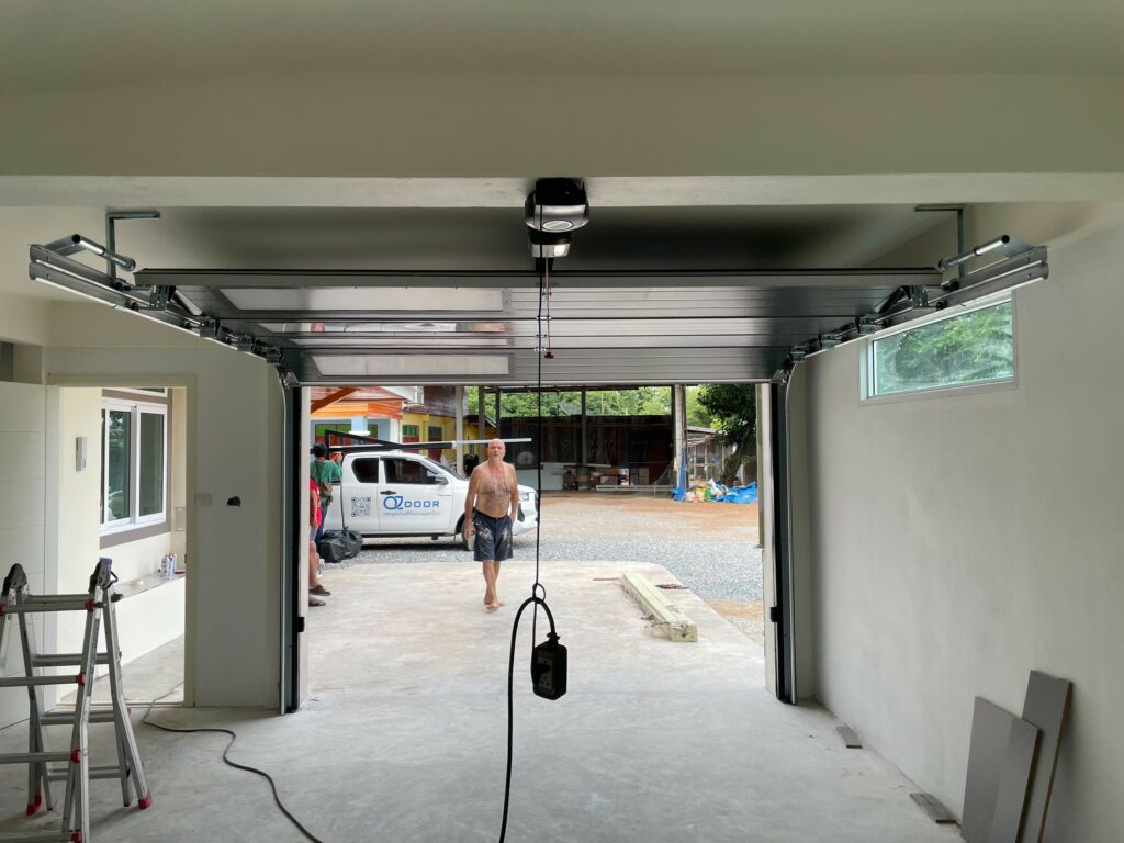 Installation photo of Garage Doors for Housing Estate / Developer in Nonthaburi by OZ DOOR (4)