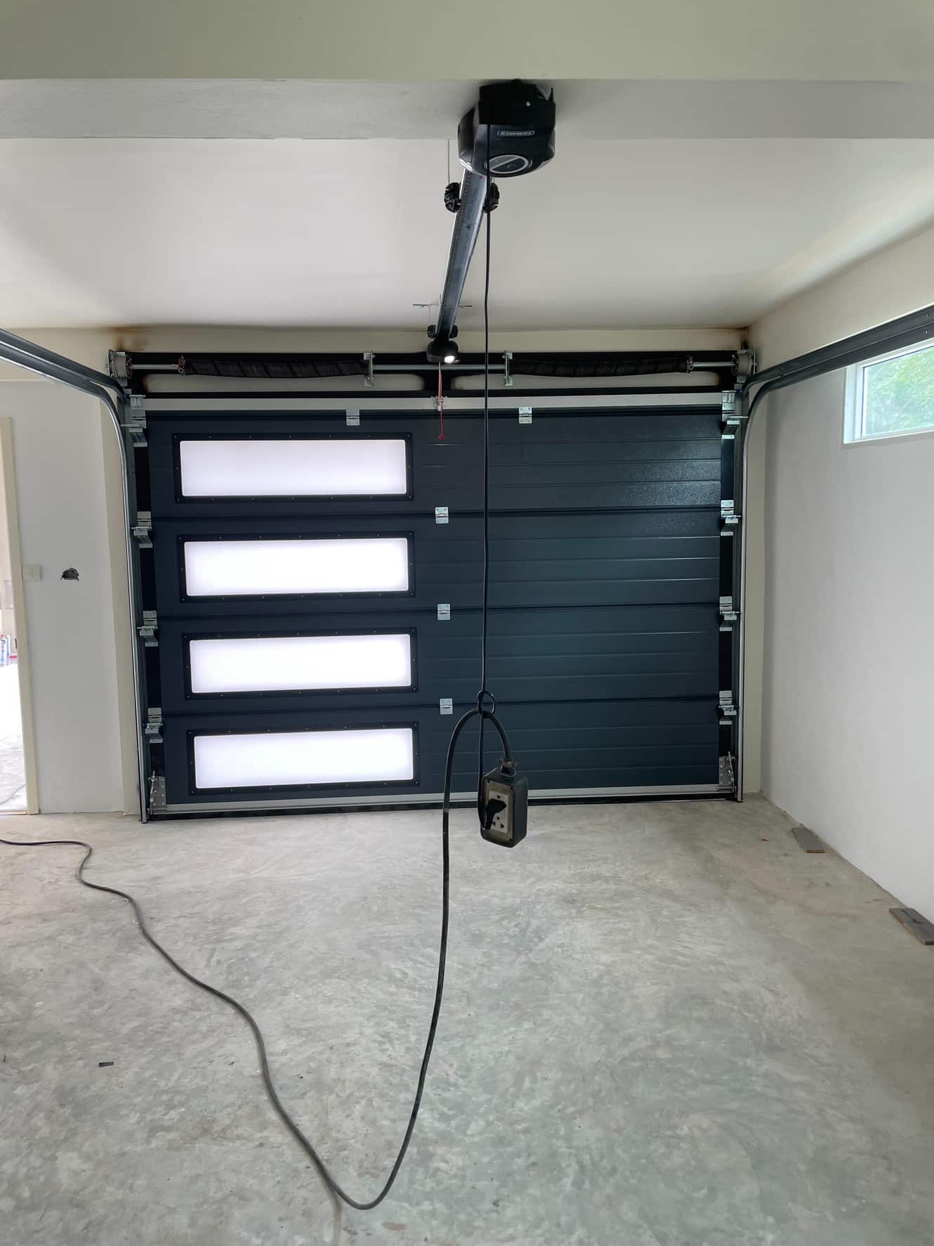 Installation photo of Garage Doors for Housing Estate / Developer in Nonthaburi by OZ DOOR (5)