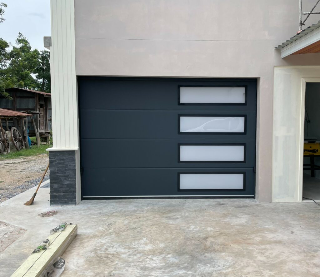Installation photo of Garage Doors for Housing Estate / Developer in Nonthaburi by OZ DOOR (2)