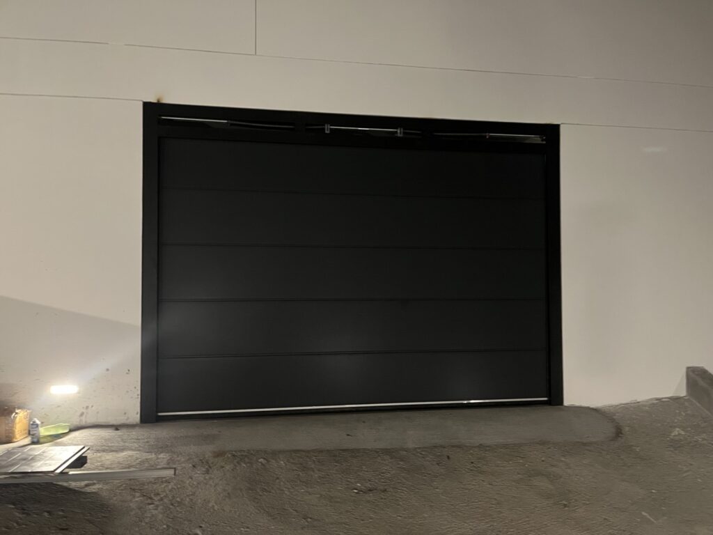 Installation photo of Garage Doors for Single House in Phuket by OZ DOOR