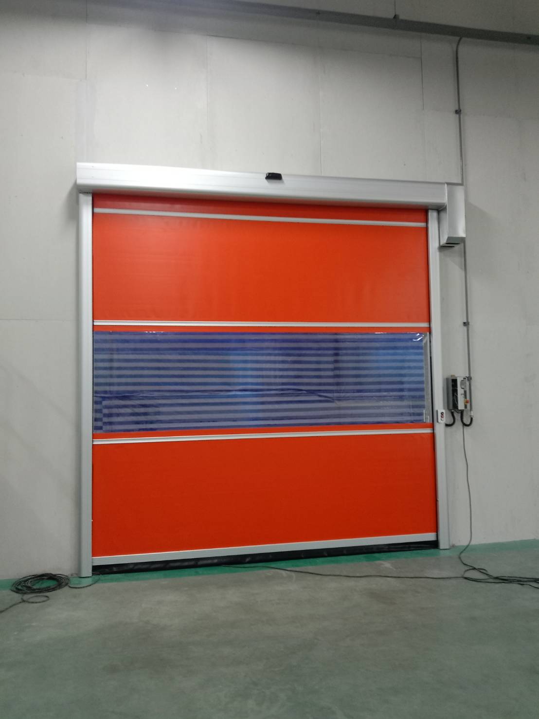 ภาพผลงานติดตั้งประตูไฮสปีด รุ่น Standard สำหรับโรงงานอุตสาหกรรม ที่ระยอง โดย OZ DOOR