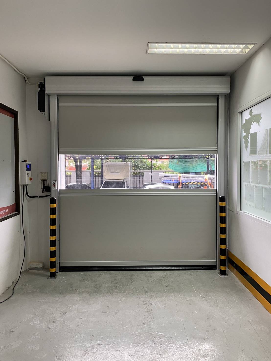 ภาพผลงานติดตั้งประตูไฮสปีด รุ่น Standard สำหรับโรงงานอุตสาหกรรม ที่สมุทรสาคร โดย OZ DOOR (2)