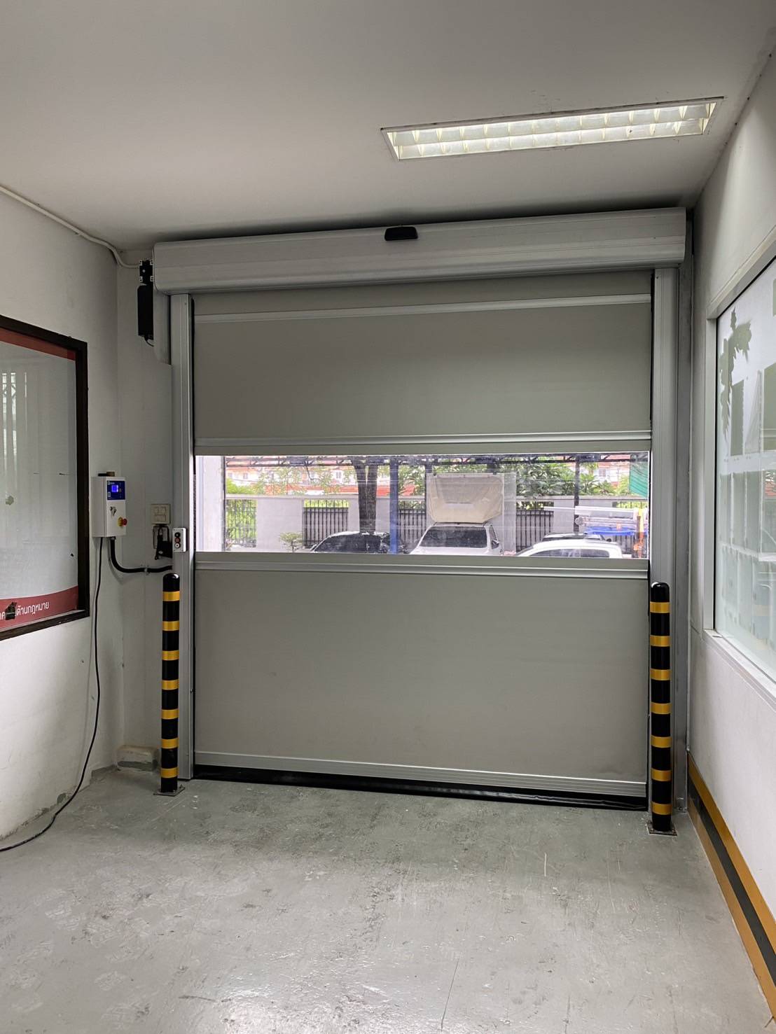 ภาพผลงานติดตั้งประตูไฮสปีด รุ่น Standard สำหรับโรงงานอุตสาหกรรม ที่สมุทรสาคร โดย OZ DOOR (3)